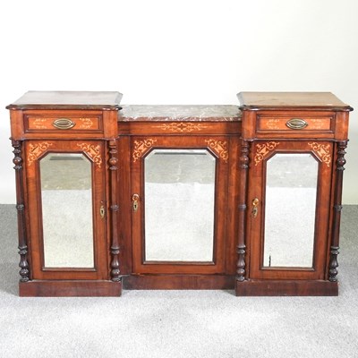 Lot 561 - A 19th century fruitwood inverted breakfront...