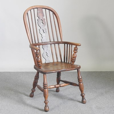 Lot 126 - A 19th century Windsor style armchair, on...