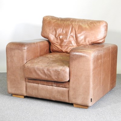 Lot 515 - A brown leather armchair, together with a 1970'...