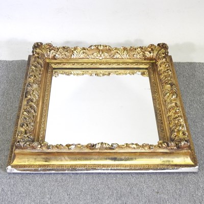 Lot 557 - An ornate 19th century carved wood and gilt...