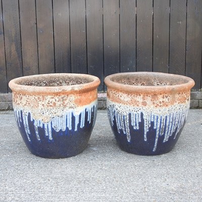 Lot 358 - A pair of large drip glazed garden pots, 59cm...