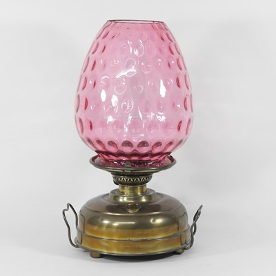 Lot 240 - A 19th century brass oil lamp, with a dimpled...