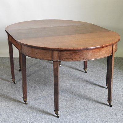 Lot 466 - A George III mahogany D end dining table, on...