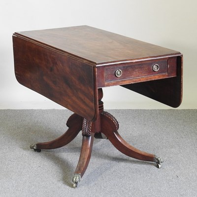 Lot 323 - A Regency mahogany pembroke table, on a...