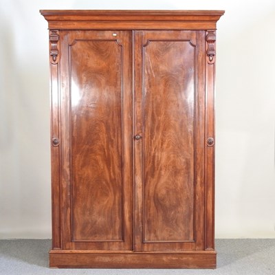 Lot 314 - A William IV mahogany double wardrobe,...