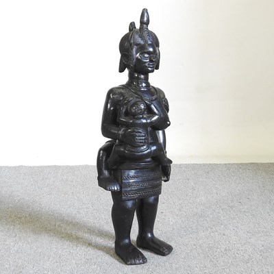 Lot 349 - A large African carved hardwood figure, of a...