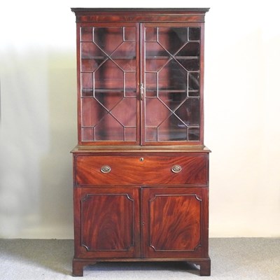 Lot 499 - A George III mahogany secretaire bookcase,...