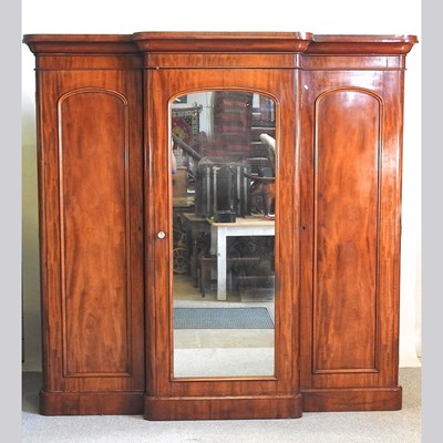 Lot 498 - A Victorian mahogany breakfront triple...