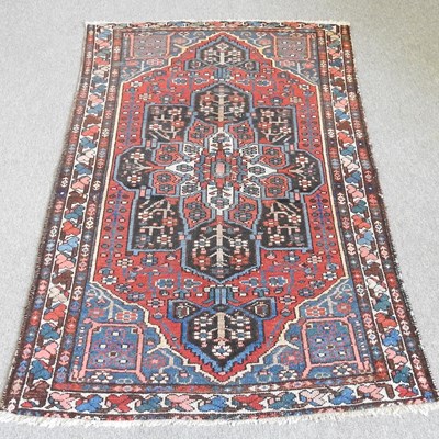 Lot 166 - A Persian carpet, with a central flowerhead...