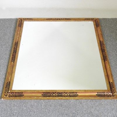 Lot 244 - A gilt framed wall mirror, with stencilled...