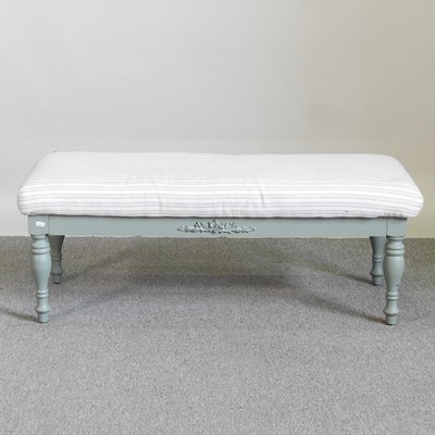 Lot 319 - A green painted and cream upholstered stool,...