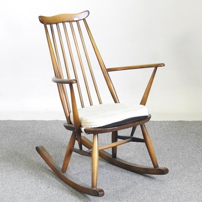 Lot 270 - A 1970's Ercol spindle back rocking chair