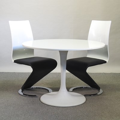 Lot 745 - A contemporary white circular dining table