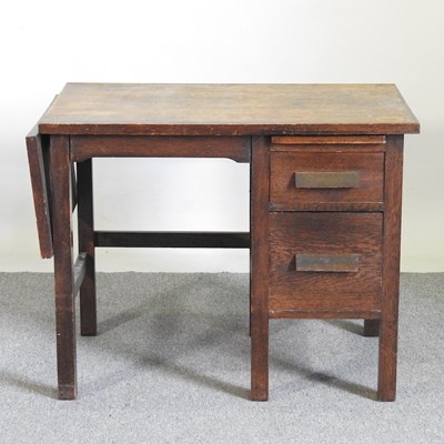 Lot 430 - A 1930's oak single pedestal desk