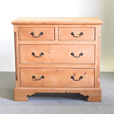 Lot 26 - A modern pine chest of drawers, on bracket feet