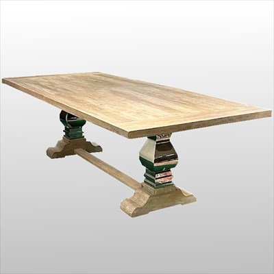 Lot 519 - A modern limed elm refectory dining table, on...