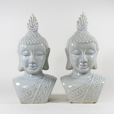 Lot 173 - A pair of glazed pottery busts of Buddha, 40cm...