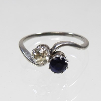 Lot 482 - A platinum, diamond and sapphire two stone...