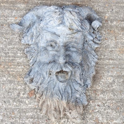 Lot 35 - A lead garden mask, in the form of a Green Man,...