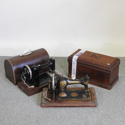 Lot 129 - A 19th century hand sewing machine and two...