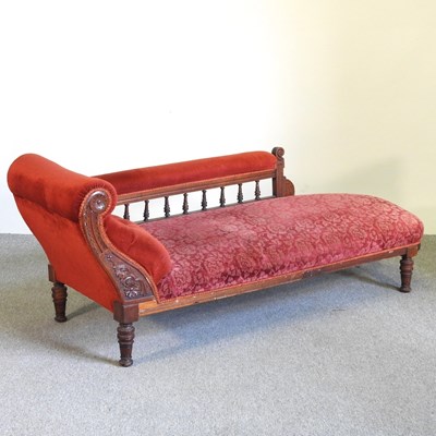 Lot 185 - A late Victorian red upholstered chaise longue,...