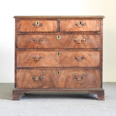 Lot 107 - A George III and later walnut chest of drawers,...