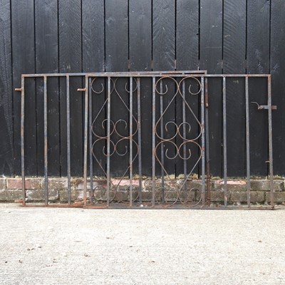 Lot 60 - A pair of black painted wrought iron garden...