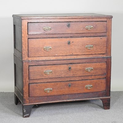 Lot 388 - An 18th century oak chest, in two parts,...