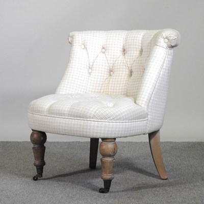 Lot 307 - A Victorian style cream upholstered button...