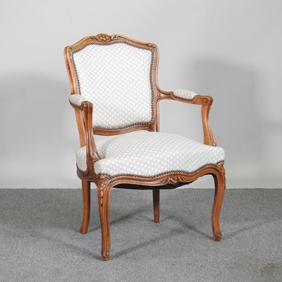 Lot 463 - A French carved walnut and cream upholstered...