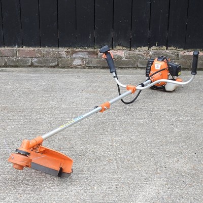 Lot 164 - A Parker petrol strimmer