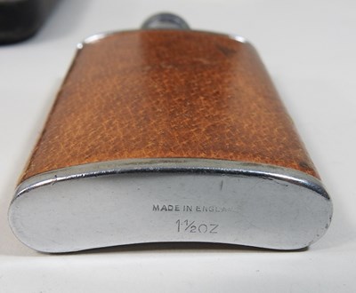 Lot 73 - An early 20th century silver and leather hip flask