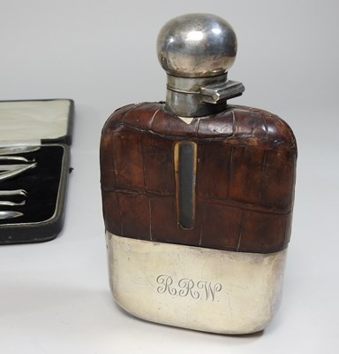 Lot 73 - An early 20th century silver and leather hip flask