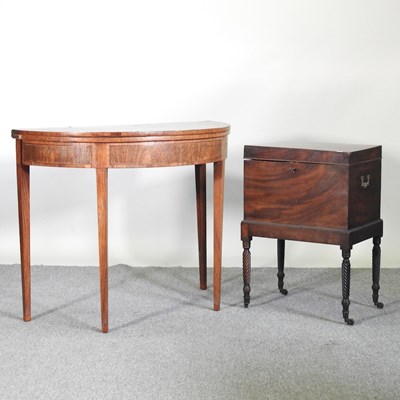 Lot 66 - A George III D shaped folding card table,...