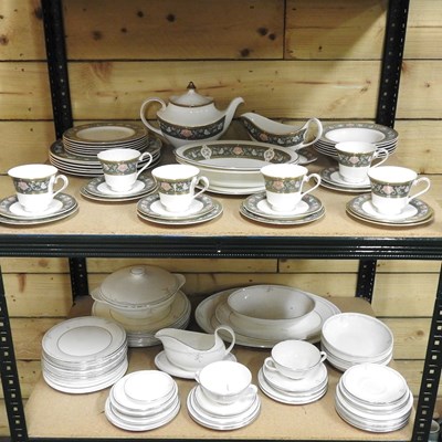 Lot 267 - A Royal Doulton Tudor Court pattern bone china...