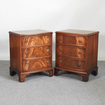 Lot 383 - A pair of Reprodux mahogany bow front bedside...