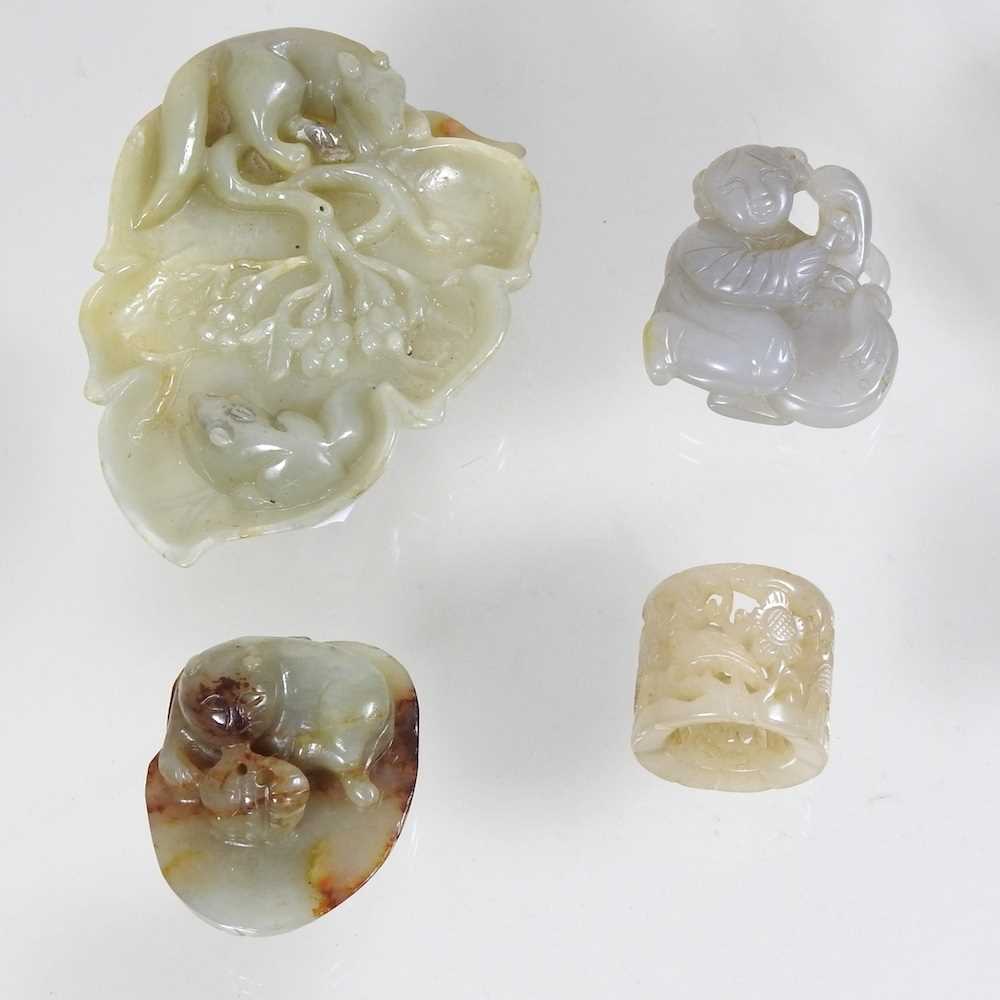 Lot 62 - An oriental jade coloured hardstone carving of a leaf