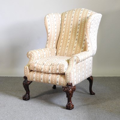 Lot 198 - A George I style cream upholstered wing...