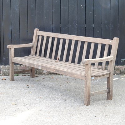 Lot 90 - A slatted wooden garden bench