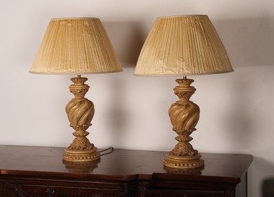 Lot 516 - A pair of table lamps, each of wrythen form...