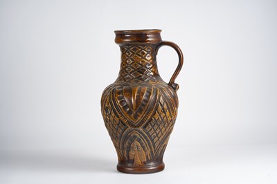 Lot 139 - A large West German pottery jug, having a...