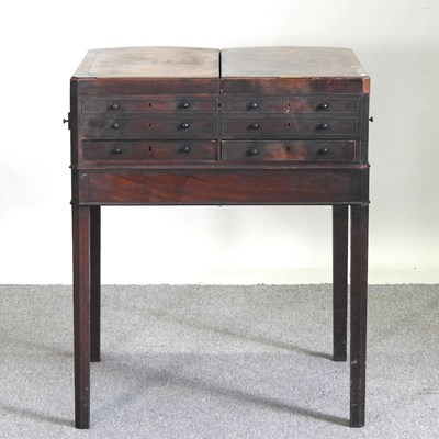 Lot 409 - A George III mahogany enclosed dressing chest,...