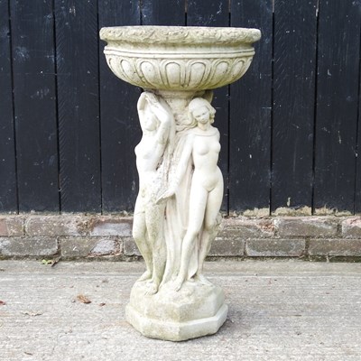 Lot 9 - A cast stone figural bird bath, 89cm high