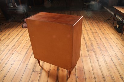 Lot 4 - A Danish teak chest of six long drawers, 1960s,...