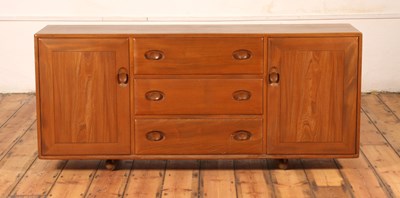 Lot 439 - An Ercol blonde elm Windsor sideboard, model...