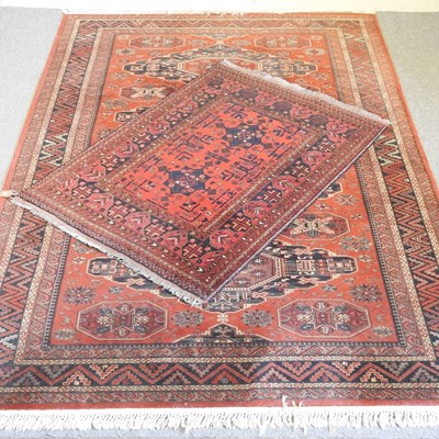 Lot 464 - A Turkish carpet, with geometric designs on a...