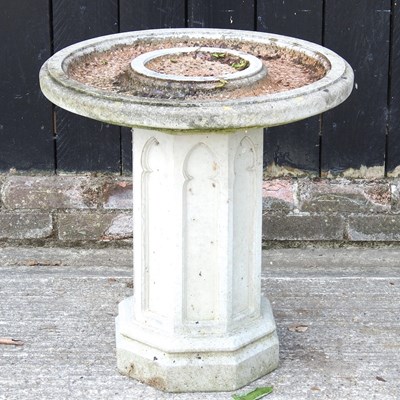 Lot 575 - A cast stone bird bath, with tracery decoration