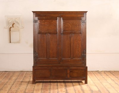 Lot 420 - An oak cupboard, 18th century, having panelled...