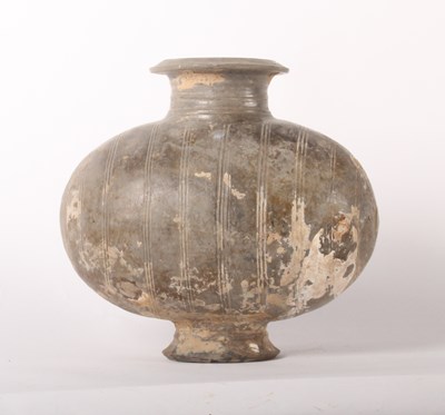 Lot 209 - A Chinese Han Dynasty burnished earthenware cocoon vase