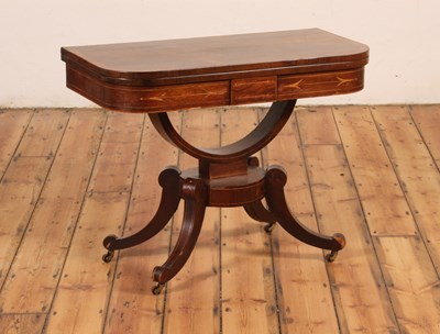 Lot 425 - A Regency rosewood D-shaped card table, having...